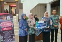 SOLIDARITAS WARGA BANJARBARU MENGALIR KE SUMATRA, DONASI RP 860 JUTA DISALURKAN UNTUK KORBAN BANJIR