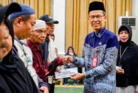 PULUHAN MUSTAHIK TERIMA SANTUNAN RAMADAN DARI BAZNAS BANJARBARU
